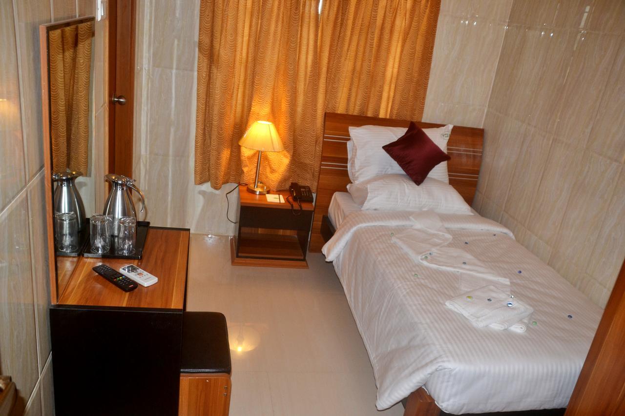Peace Inn Chennai Værelse billede